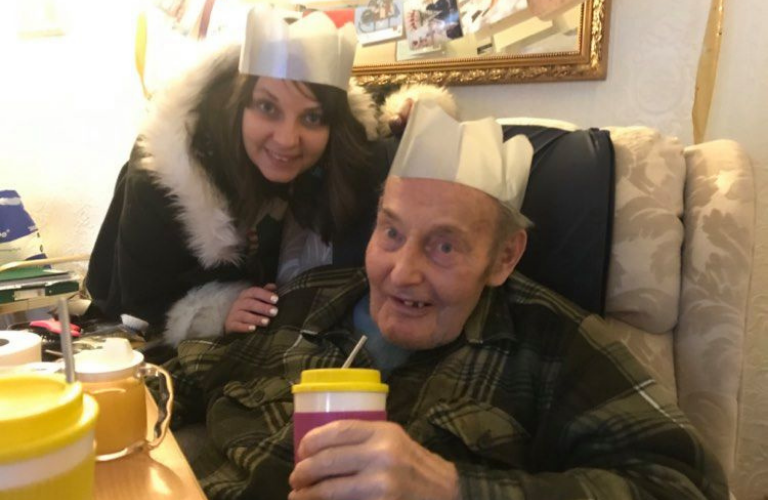 Rachael and her granddad celebrating Christmas